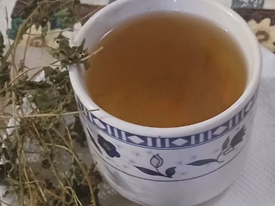 Cup of Cerasee Tea - Almonds and Olivez - Copyright