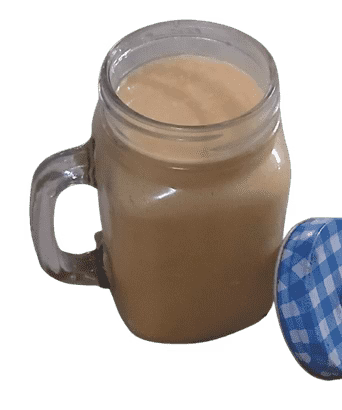 Glass of Jamaican Carrot Punch - Almonds and Olivez - Copyright