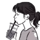 A girl drinking boba tea - Almonds and Olivez
